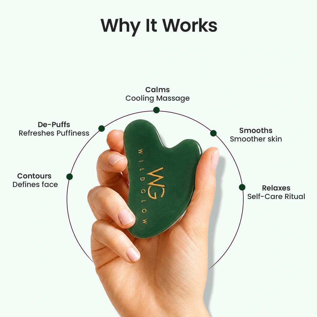 A hand holds a dark green jade Gua sha massage tool with gold lettering that reads 'WILD GLOW'. The image is a marketing graphic titled 'Why It Works' with text describing benefits like calming, smoothing, and relaxing, set against a pale mint green background.