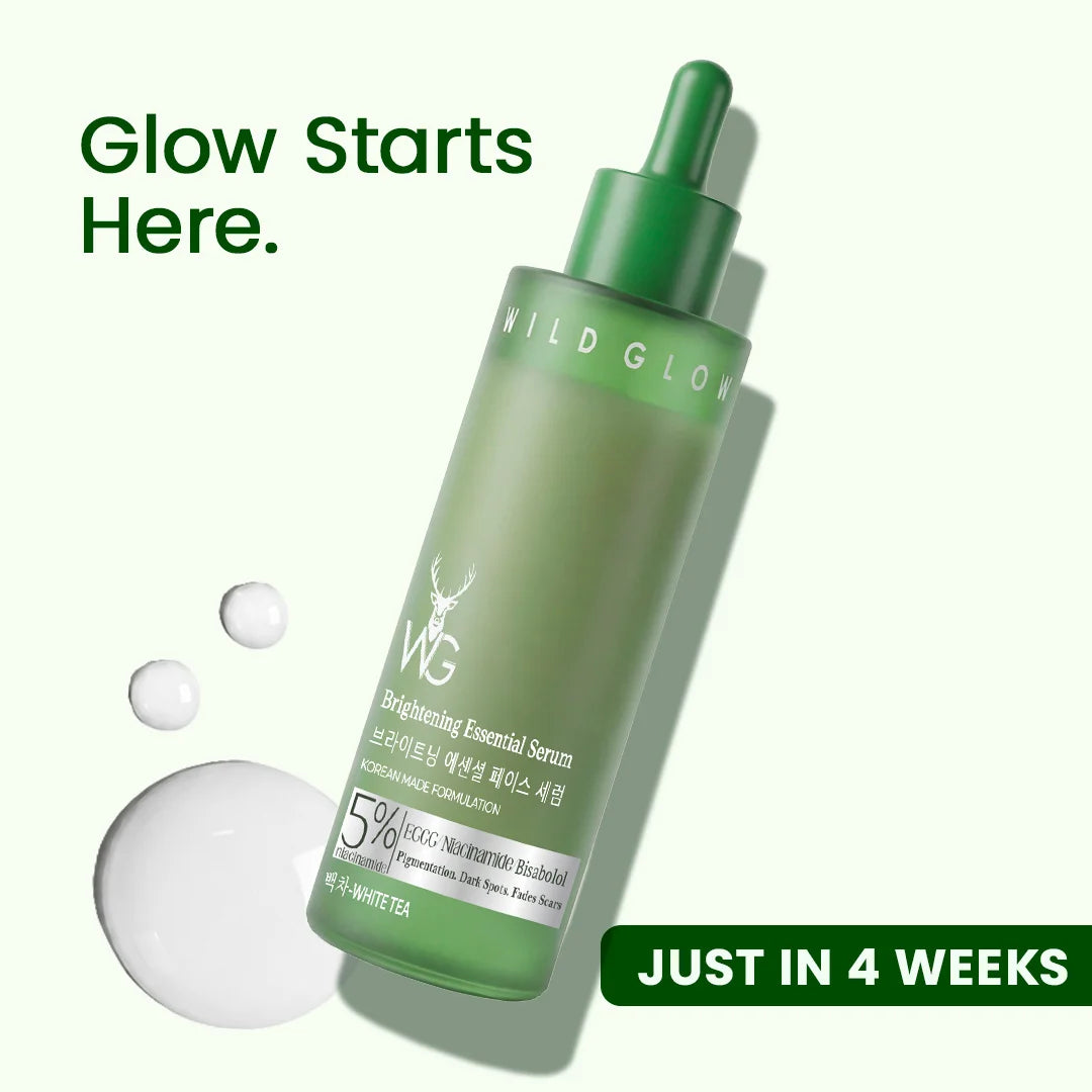Wild Glow Brightening Essential Serum in a frosted green bottle with a green dropper cap, shown on a pale green background with text reading 'Glow Starts Here.' and 'JUST IN 4 WEEKS'.
