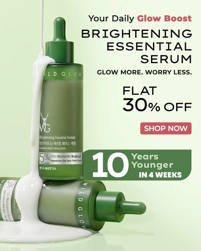 Wild Glow brightening essential serum with promotional text on a light green background