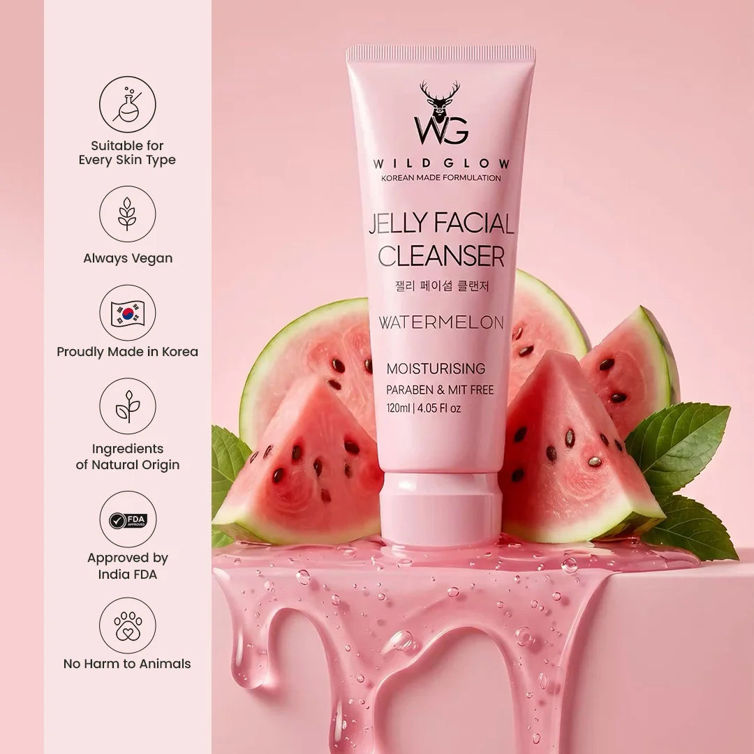 Wildglow Jelly Facial Cleanser Watermelon tube standing on a pink surface with watermelon slices and green leaves behind it, plus a vertical list of product claims on the left.